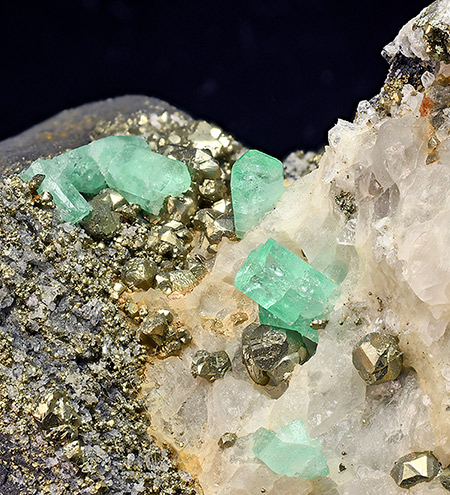 Beryl var. Emerald on Calcite with Pyrite - Coscuez Mine (Cosquez Mine), Muzo Municipality, Boyacá Department, Colombia