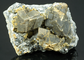 Siderite on quartz and tetrahedrite, Herminia mine, Julcani District, Peru