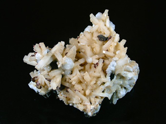 Natrolite, Analcime, Rhodochrosite and Aegirine - Poudrette quarry (Demix quarry; Uni-Mix quarry; Desourdy quarry; Carrire Mont Saint-Hilaire), Mont Saint-Hilaire, La Valle-du-Richelieu RCM, Montrgie, Qubec, Canada