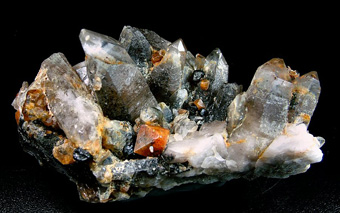 Scheelite, Cassiterite on smoky Quartz - Tenkergin Mine (Volchye), Iul'tinskiy Mining Complex, Chukotskii Autonomous Okrug, Far-Eastern Region, Russia