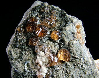 Grossular, var. Hessonite with Diopside? - Jeffrey Mine (Johns-Manville Mine), Asbestos, Les Sources RCM, Estrie, Qubec, Canada