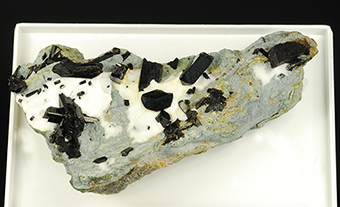 Neptunite and joaquinite - Dallas Gem Mine - Dallas Gem Mine area - San Benito River headwaters area - New Idria District - Diablo Range - San Benito Co. - California - USA