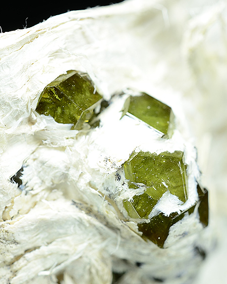 Andradite var. Demantoide -Sferln asbestos mine, Vallone del Cengiaccio , Lanzada, Lanterna Valley, Malenco Valley, Valtellina, Sondrio Province, Lombardy, Italy